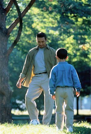 simsearch:700-00036949,k - Father and Son Playing Soccer Stock Photo - Rights-Managed, Code: 700-00039385