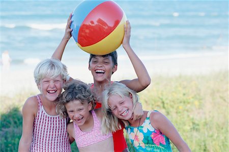 Group Portrait of Girls in Swimwear on Beach Stock Photo - Rights-Managed, Code: 700-00039629