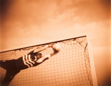 simsearch:700-00048630,k - Goaltender Catching Soccer Ball Stock Photo - Rights-Managed, Code: 700-00039888