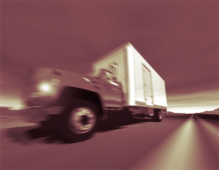 simsearch:700-00068576,k - Blurred View of Transport Truck On Highway Stock Photo - Rights-Managed, Code: 700-00030714