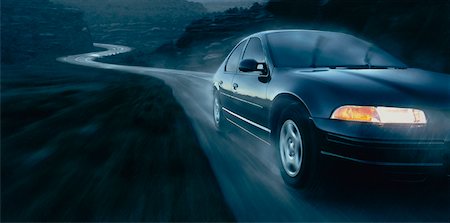 simsearch:700-00089787,k - Close-Up of Car on Winding Road In Rain Stock Photo - Rights-Managed, Code: 700-00031523