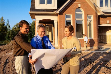 People Looking at Blueprints for Home, Burlington, Ontario, Canada Stock Photo - Rights-Managed, Code: 700-00031543