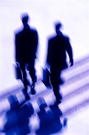 simsearch:700-01195953,k - Blurred View of Businessmen Walking Up Steps Stock Photo - Rights-Managed, Code: 700-00031723