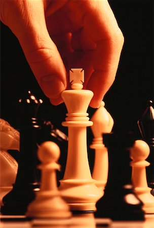 simsearch:700-00075674,k - Hand Moving Chess Piece Stock Photo - Rights-Managed, Code: 700-00032193