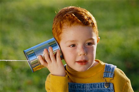 simsearch:700-00025806,k - Child Holding Tin Can Telephone Outdoors Stock Photo - Rights-Managed, Code: 700-00032686