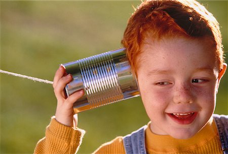 simsearch:700-00025806,k - Child Using Tin Can Telephone Outdoors Stock Photo - Rights-Managed, Code: 700-00032738