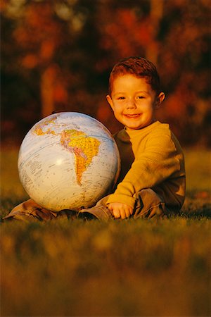simsearch:700-00362048,k - Child Holding Globe Outdoors South America Stock Photo - Rights-Managed, Code: 700-00032893