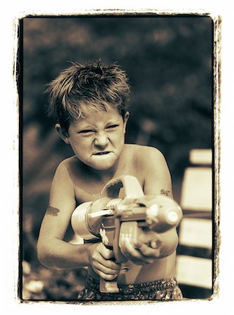 simsearch:700-00035072,k - Boy Holding Water Gun Stock Photo - Rights-Managed, Code: 700-00033473