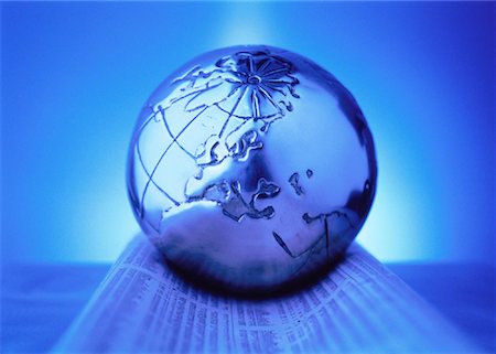 simsearch:700-00045162,k - Metal Globe on Financial Pages Europe Stock Photo - Rights-Managed, Code: 700-00044041
