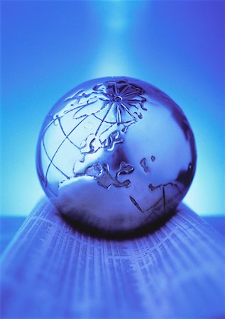 simsearch:700-00045162,k - Metal Globe on Financial Pages Europe Stock Photo - Rights-Managed, Code: 700-00044042