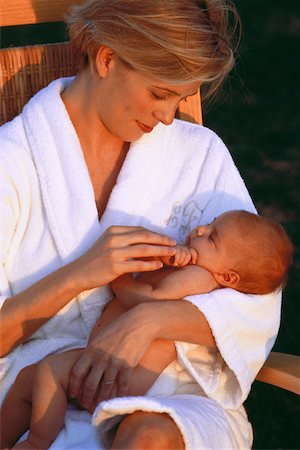simsearch:700-00080994,k - Mother Holding Baby Outdoors Stock Photo - Rights-Managed, Code: 700-00044235