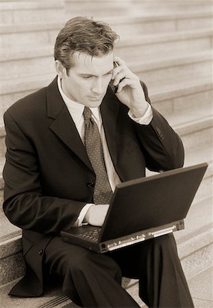 simsearch:700-00163379,k - Businessman Sitting on Steps Using Cell Phone and Laptop Computer Outdoors Stock Photo - Rights-Managed, Code: 700-00044582