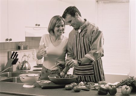 Couple Preparing Food in Kitchen Stock Photo - Rights-Managed, Code: 700-00045166