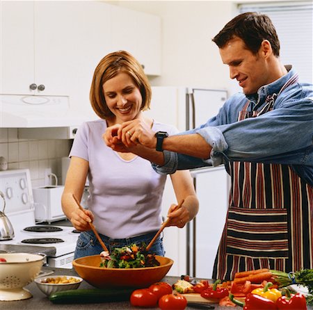 Couple Preparing Food in Kitchen Stock Photo - Rights-Managed, Code: 700-00045492