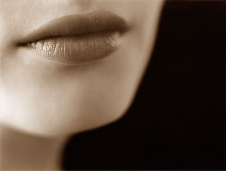 simsearch:873-06440787,k - Close-Up of Woman's Mouth Stock Photo - Rights-Managed, Code: 700-00046553
