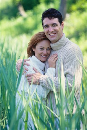 Portrait of Couple Standing in Field Stock Photo - Rights-Managed, Code: 700-00046788