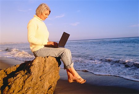 simsearch:700-00083403,k - Mature Woman Using Laptop Computer on Beach Stock Photo - Rights-Managed, Code: 700-00046873