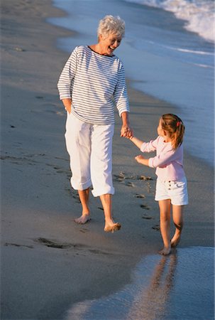 simsearch:700-00046927,k - Grandmother and Granddaughter Walking on Beach, Holding Hands Stock Photo - Rights-Managed, Code: 700-00046926
