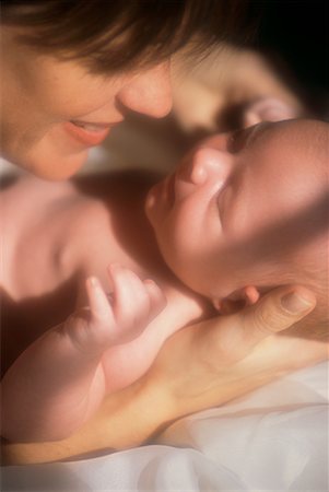 simsearch:700-00080994,k - Close-Up of Mother Holding Baby Stock Photo - Rights-Managed, Code: 700-00046944