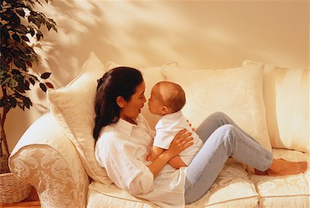 simsearch:700-00080994,k - Mother and Baby on Sofa Stock Photo - Rights-Managed, Code: 700-00047067