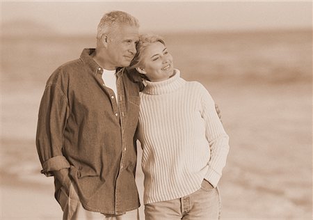 peter griffith - Mature Couple Walking on Beach Stock Photo - Rights-Managed, Code: 700-00047392