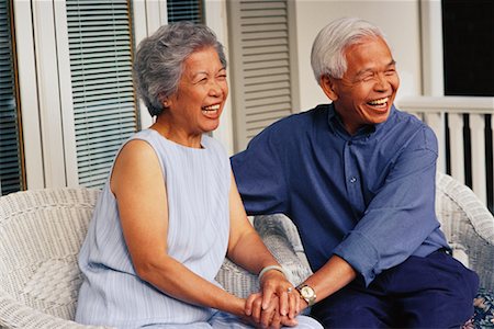 Mature Couple Sitting on Porch Laughing Stock Photo - Rights-Managed, Code: 700-00048014