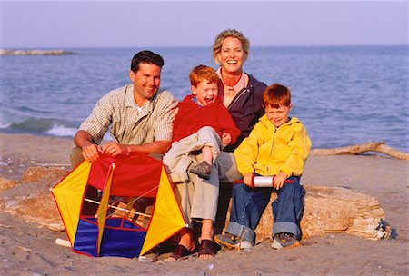 family beach kites - Portrait of Family with Kite on Beach Stock Photo - Rights-Managed, Code: 700-00048038
