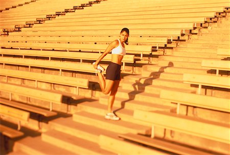 sport or fitness (activity) - Femme qui s'étend sur escalier extérieur Photographie de stock - Rights-Managed, Code: 700-00048152