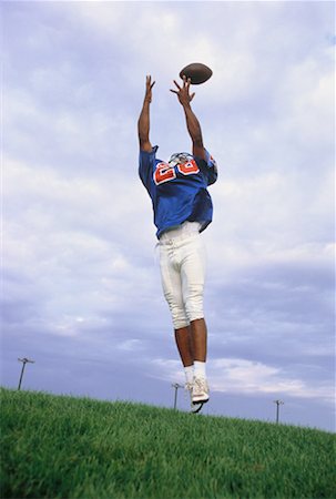 simsearch:700-00048630,k - Football Player Jumping to Catch Ball Stock Photo - Rights-Managed, Code: 700-00048318