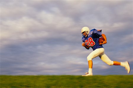 simsearch:700-00048630,k - Football Player Running with Football Stock Photo - Rights-Managed, Code: 700-00048320