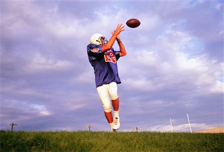 simsearch:700-00048630,k - Football Player Catching Ball Stock Photo - Rights-Managed, Code: 700-00048322