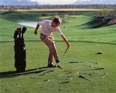 Golfer Breaking Golf Clubs on Golf Course Stock Photo - Rights-Managed, Code: 700-00048475