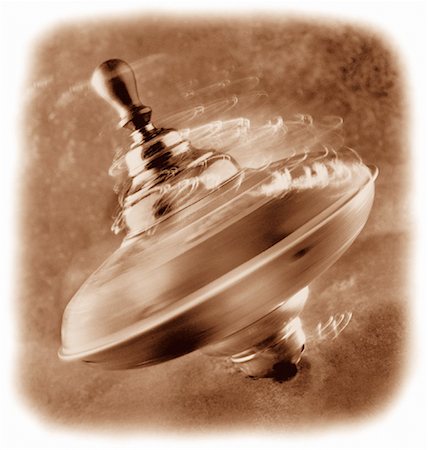 simsearch:700-00035072,k - Close-Up of Spinning Top in Motion Stock Photo - Rights-Managed, Code: 700-00048564