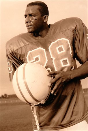 simsearch:700-00048630,k - Portrait of Football Player Holding Helmet Outdoors Stock Photo - Rights-Managed, Code: 700-00048636