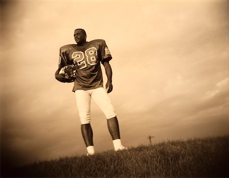 simsearch:700-00048630,k - Football Player Holding Helmet Outdoors Stock Photo - Rights-Managed, Code: 700-00049341