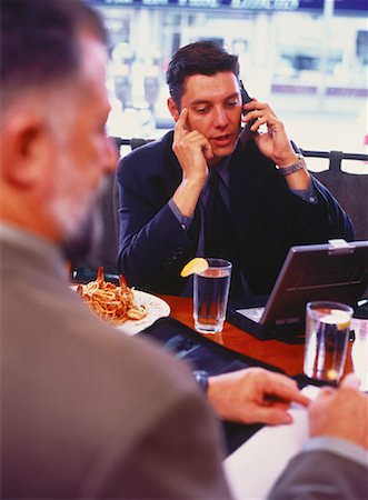 simsearch:700-00163379,k - Businessmen Working in Restaurant Stock Photo - Rights-Managed, Code: 700-00049610