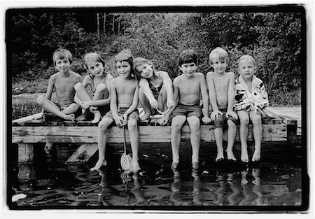 simsearch:700-01183991,k - Group Portrait of Children in Swimwear, Sitting on Dock Stock Photo - Rights-Managed, Code: 700-00041154