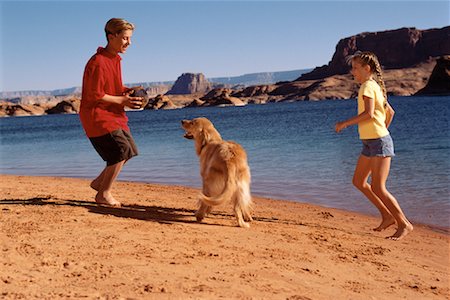 Boy and Girl on Beach with Dog Lake Powell, Arizona, USA Stock Photo - Rights-Managed, Code: 700-00041559