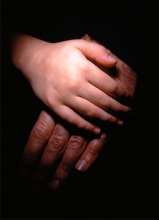 Close-Up of Hands of Man and Boy Stock Photo - Rights-Managed, Code: 700-00041799