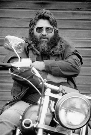 Portrait of Biker on Motorcycle Stock Photo - Rights-Managed, Code: 700-00041914