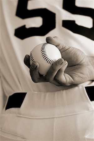 simsearch:700-00035072,k - Close-Up of Baseball Pitcher Holding Ball Behind Back Stock Photo - Rights-Managed, Code: 700-00042202
