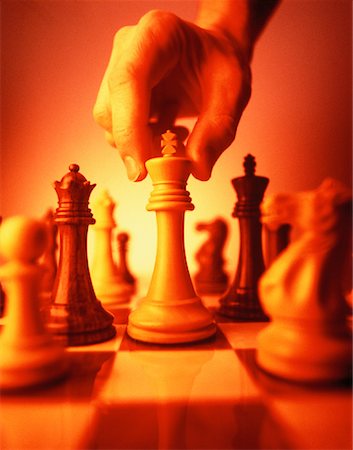 simsearch:700-00075674,k - Hand Moving Chess Pieces Stock Photo - Rights-Managed, Code: 700-00042428