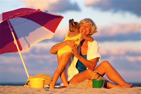 simsearch:700-00046927,k - Grandmother and Granddaughter in Swimwear, Embracing on Beach Stock Photo - Rights-Managed, Code: 700-00043378