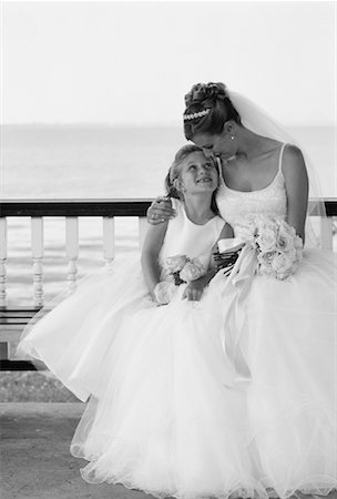simsearch:700-00085631,k - Bride and Flower Girl Sitting On Bench Outdoors Stock Photo - Rights-Managed, Code: 700-00054253