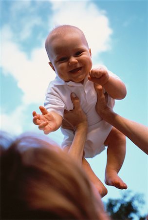 simsearch:700-00080994,k - Mother Holding Baby in Air Stock Photo - Rights-Managed, Code: 700-00055144