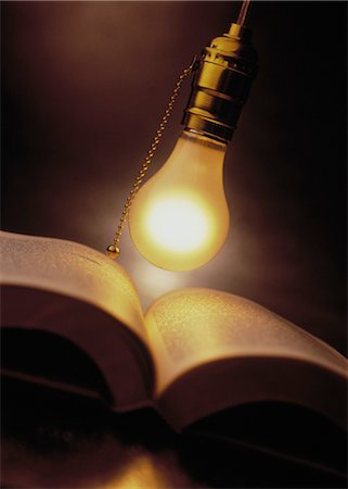 simsearch:700-00077410,k - Lightbulb Hanging Over Open Book Stock Photo - Rights-Managed, Code: 700-00055186
