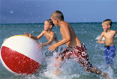 simsearch:700-00020587,k - Three Boys in Swimwear, Playing With Beach Ball in Water on Beach Stock Photo - Rights-Managed, Code: 700-00055533