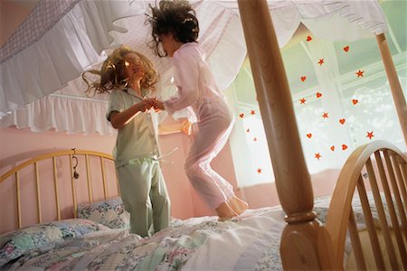 simsearch:700-00033360,k - Two Girls Jumping on Bed Stock Photo - Rights-Managed, Code: 700-00055796