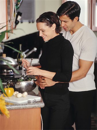 Couple Preparing Food in Kitchen Stock Photo - Rights-Managed, Code: 700-00055920
