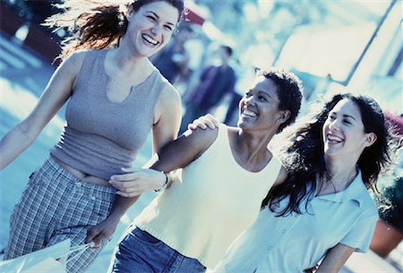 simsearch:700-00036042,k - Three Women Walking Arm in Arm on Street, Smiling Stock Photo - Rights-Managed, Code: 700-00057735